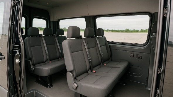 elmhurst sprinter van with driver inside